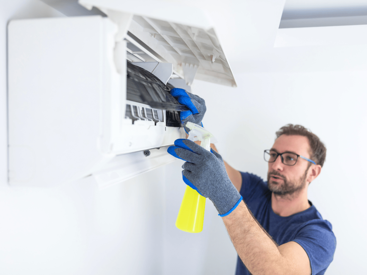 Quick AC Quote technician performing professional AC maintenance service in Powhatan, VA