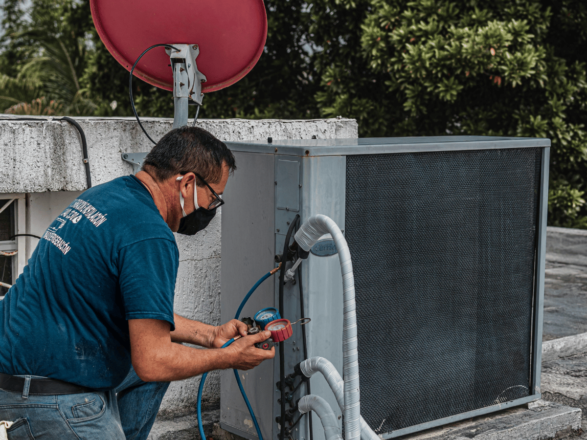 Quick AC Quote technician performing residential AC repair service in Powhatan, VA